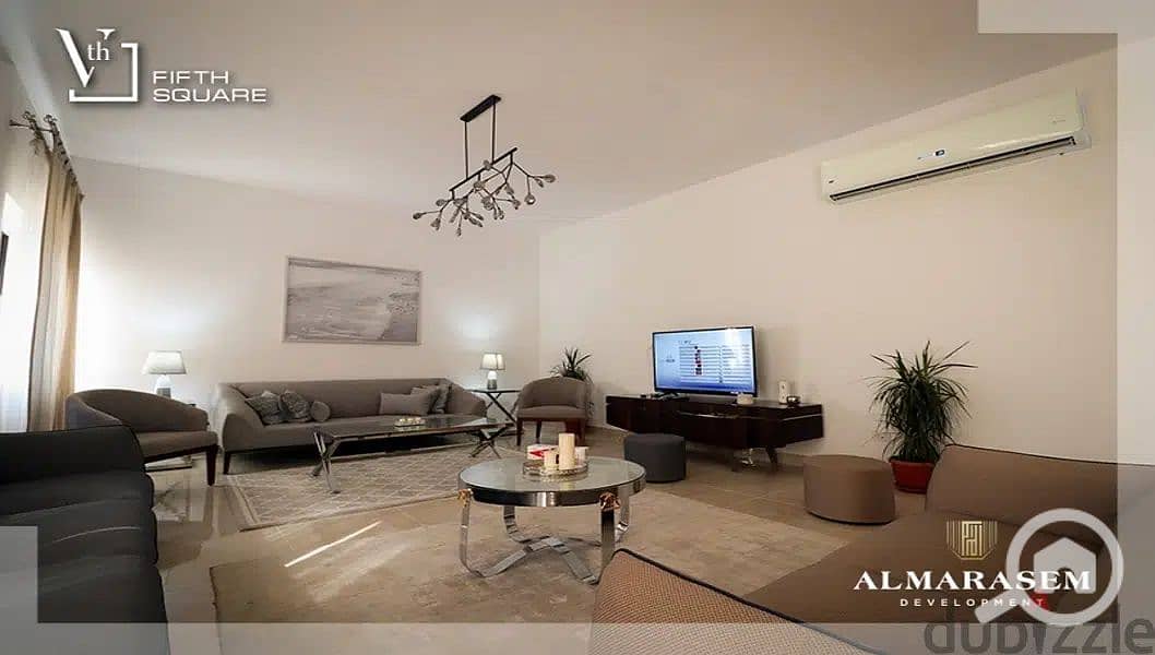 Apartment for sale, fully finished with air conditioning on Al-90 Street in front of the American University, New Cairo.