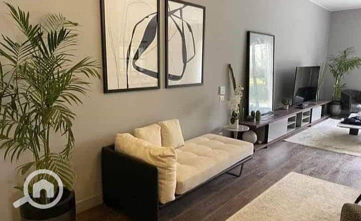 For sale by installment, a 190 sqm apartment with air conditioning, available for viewing in front of the American University at Golden Square. Selling for travel purposes. This price is a great deal that will not be repeated. New Cairo apartment.