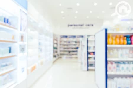 محلات تجارية  للبيع في العبور، القاهرة - abstract-blur-defocused-pharmacy-drug-store. jpg