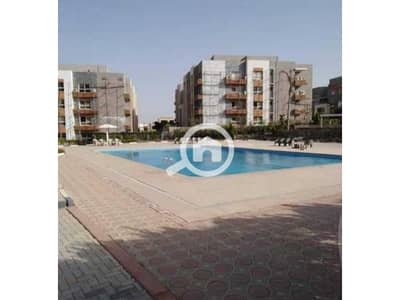 2 Bedroom Flat for Sale in Sheikh Zayed, Giza - Swimming Pool in regency compound. jpg