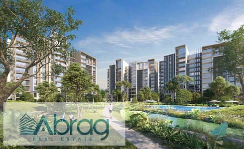 2 Bedroom Apartment for Sale in Sheikh Zayed, Giza - Landscape and Swimming Pool in Zed Towers. jpg