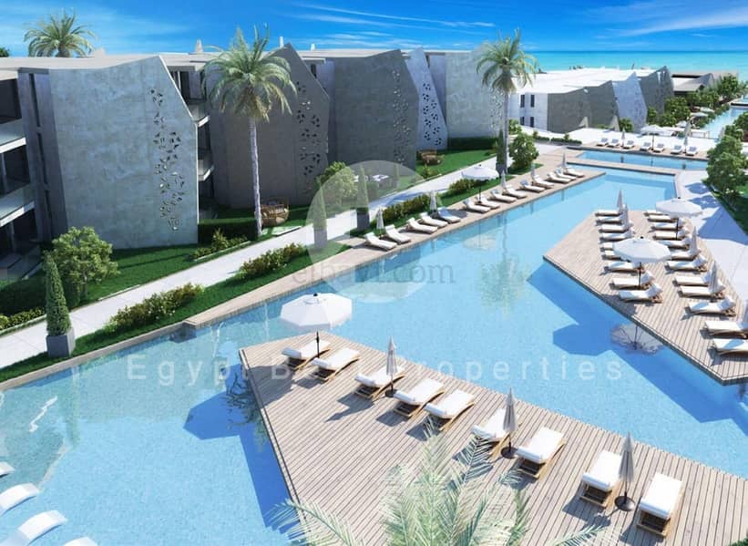 7 facilities - swimming pool -  fouka bay north coast tatweer misr 5. jpg