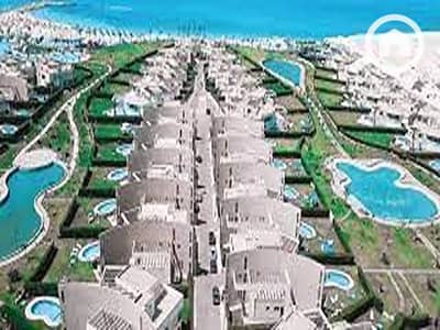 شاليه 2 غرفة نوم للبيع في الساحل الشمالي، مطروح - download (1). jpg