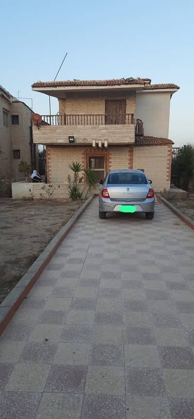 2 Bedroom Villa for Sale in North Coast, Matruh - فيلا دورين ترى البحر للبيع بقرية عايده /مصر الجديده في الساحل الشمالي