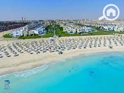 شاليه 2 غرفة نوم للبيع في الساحل الشمالي، مطروح - download (1). jpg