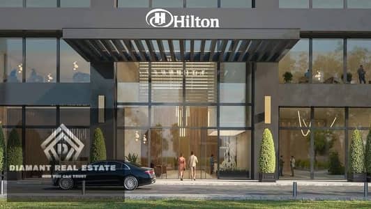 1 Bedroom Hotel Apartment for Sale in New Capital City, Cairo - 26ca2a8e-d1e4-4ab1-bbc6-6d4cc77894a9. jpg