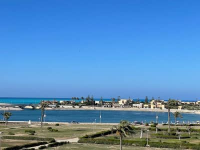 5 Bedroom Villa for Rent in North Coast, Matruh - فيلا 5 غرف بحمام سباحه للايجار مارينا 2 أول صف علي البحيرة