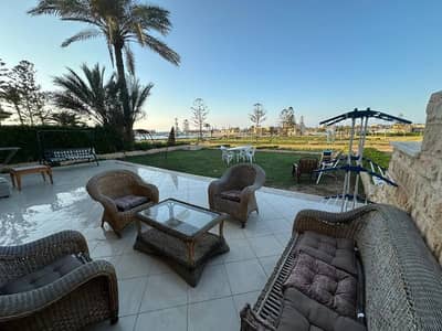 5 Bedroom Villa for Rent in North Coast, Matruh - Villa for rent in Marina 2, first row by the sandy lake