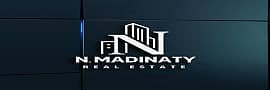 N. MADINATY