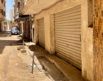 محلات تجارية  للايجار في سموحة، الإسكندرية - محل للإيجار بجوار سور جامعه فاروس - يصلح مخزن