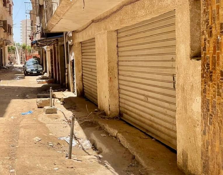 محل للإيجار بجوار سور جامعه فاروس - يصلح مخزن