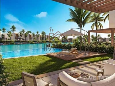 شاليه 2 غرفة نوم للبيع في الساحل الشمالي، مطروح - exterior-pool-view-hacienda-bay-water-villas-north-coast-palm-hills-2. jpg