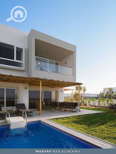 3 Bedroom Chalet for Sale in North Coast, Matruh - Chalet with a garden in the village of the summer resort for sale by the lagoon at kilometer 211 on the coast