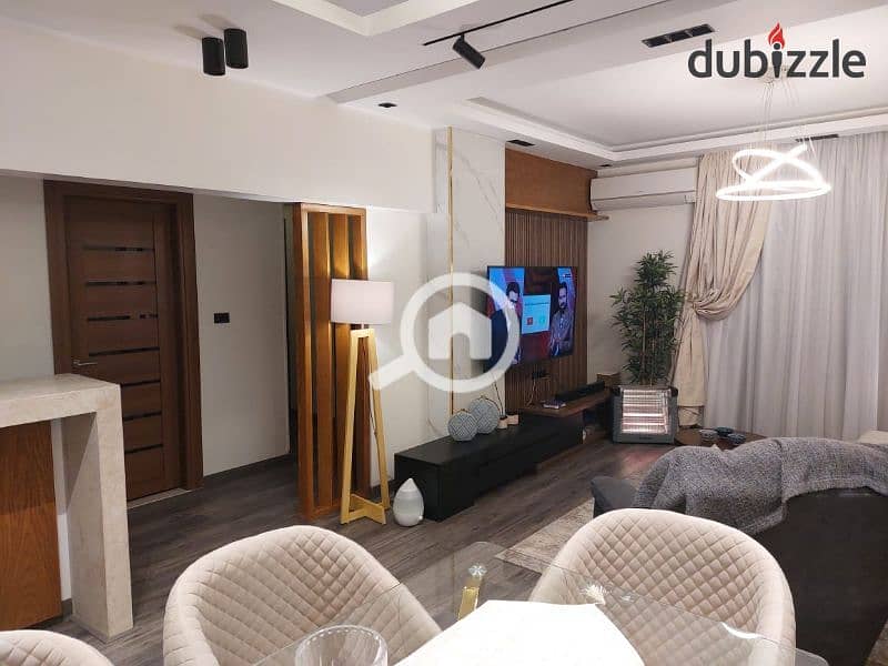 Apartment with garden for sale in Galleria compound, fully finished with complete furnishings