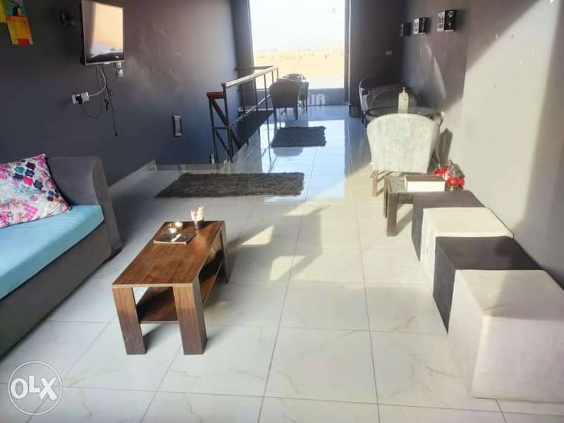 محل مجهز بمول الحى الايطالي حدايق اكتوبر علي الطريق بجوار خير زمان محل مجهز بمول الحى الايطالي حدايق اكتوبر علي الطريق بجوار خير زمان