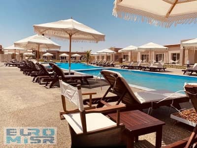 3 Bedroom Chalet for Sale in North Coast, Matruh - 228-vacation-in-north-coast-gaia-resort-compound-kKlXI4nYHz. jpg