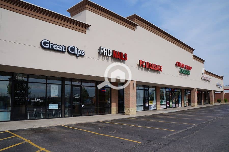 2 58192_bigstock-Strip-Mall-91000364. jpg