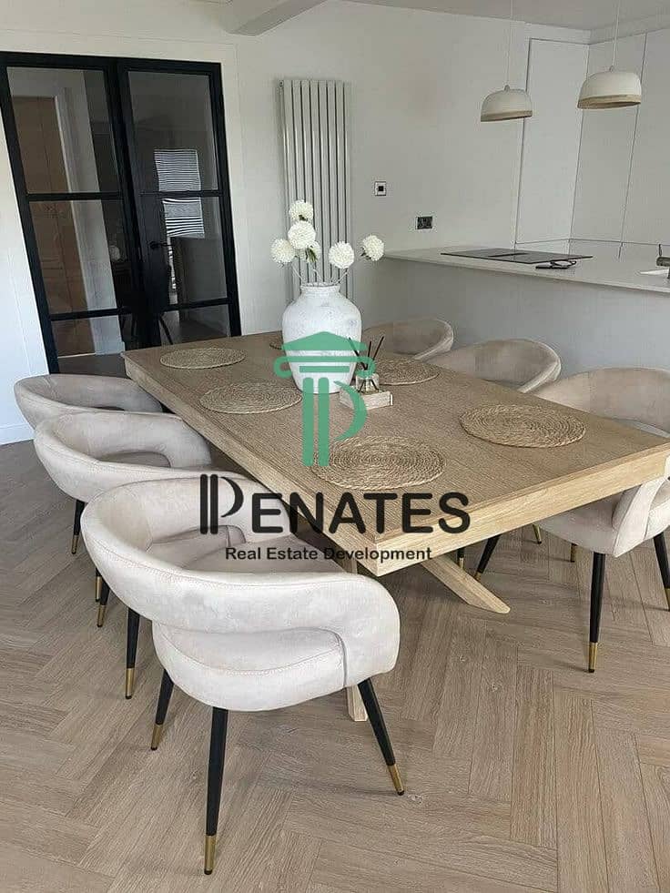 10 The Amelia solid whitewash wood top dining table…. jpeg