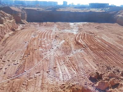 أرض سكنية  للبيع في 6 أكتوبر، الجيزة - ارض في الحي الثاني اكتوبر الجديدة
