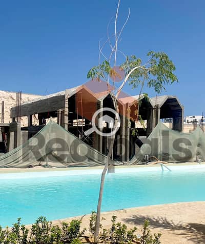 دوبلكس 2 غرفة نوم للبيع في الساحل الشمالي، مطروح - d1093a30-1ea0-4fff-b7fc-c5246b6d70dc. jpeg
