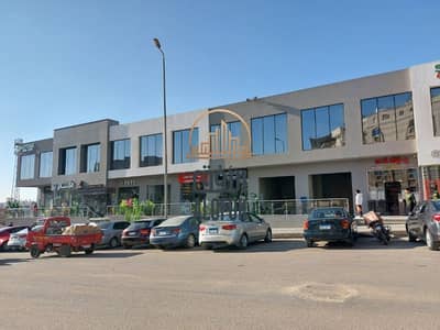 Retail for Sale in New Cairo, Cairo - محل للبيع في التجمع مول ذا ماركت the market علي جمال عبدالناصر متأجر