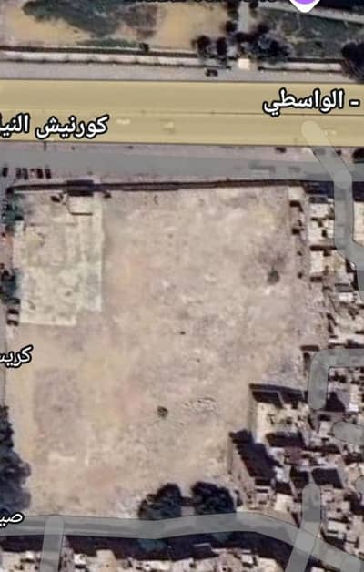 أرض تجارية  للبيع في حدائق الاهرام، الجيزة - ارض للبيع على كورنيش النيل 12300م