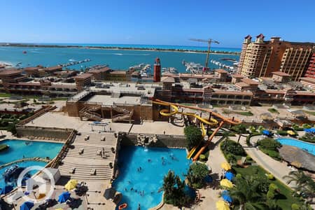 2 Bedroom Chalet for Sale in North Coast, Matruh - شاليه مميز للبيع بورتو مارينا فيو بحر و حمام السباحة تشطيب وفرش خاص