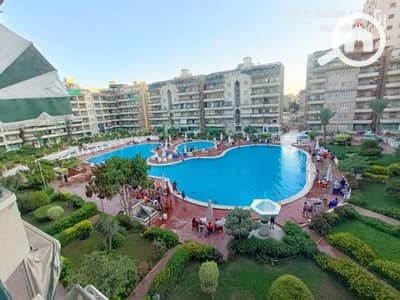 2 Bedroom Apartment for Sale in Agami, Alexandria - شقة بكمباوند الزهور بالإسكندرية النخيل 1 قرية ٦اكتوبر العجمي الكيلو21