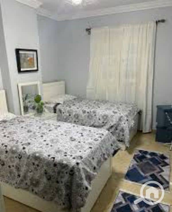 In my city, B11, an air-conditioned furnished apartment with a wide garden view, close to all services.