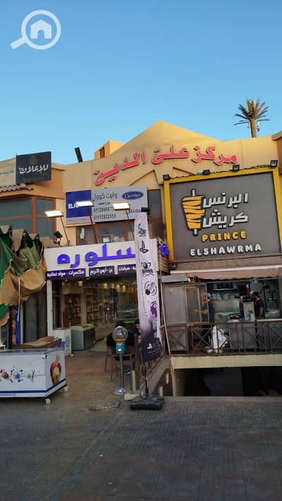 محلات تجارية  للبيع في 6 أكتوبر، الجيزة - محل 27م فى الحى الثانى خطوات من الحصرى