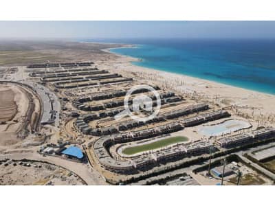 دوبلكس 3 غرف نوم للبيع في الساحل الشمالي، مطروح - DJI_0023-1024x576-1500x900 (1). jpg