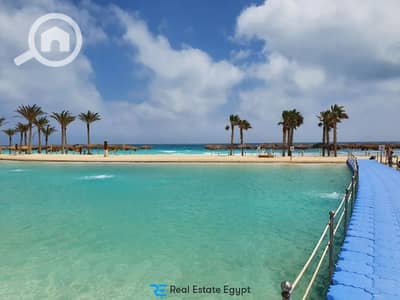 شاليه 2 غرفة نوم للبيع في الساحل الشمالي، مطروح - 874-in-north-coast-haciena-bay-resort-QQZHrG11cu. jpg