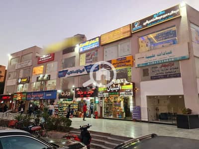 محلات تجارية  للبيع في حدائق اكتوبر، الجيزة - محل تجارى للبيع دور أول مول يوتوبيا حدائق أكتوبر