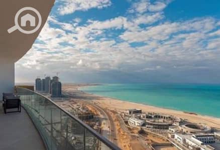 2 Bedroom Chalet for Sale in North Coast, Matruh - Chalet with sea view and lagoon, fully finished with air conditioners, for sale in installments over 12 years in El Alamein Towers