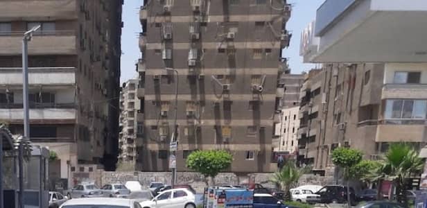 أرض سكنية  للبيع في مدينة نصر، القاهرة - ارض مباني للبيع مرخصه للبناء علي شارع حسن مأمون في مدينه نصر