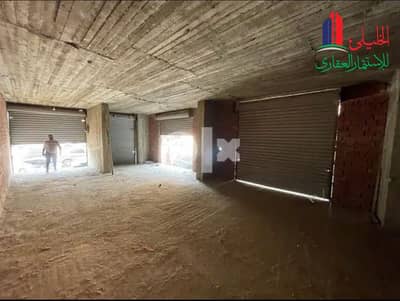 Retail for Rent in Rod al-Farag, Cairo - For rent, a corner shop of 130 m in Shubra Misr, a busy area.