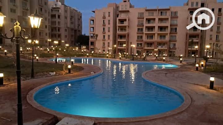 For quick sale, a 200 sqm apartment in Garden Hills Compound, 6th of October, with a garden view.