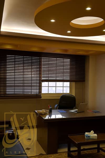 Office for Rent in New Cairo, Cairo - 20250713_0950_مكتب بمتعلقات وستائر_remix_01k018nga1f5ct9f0w8hb0m78g. png