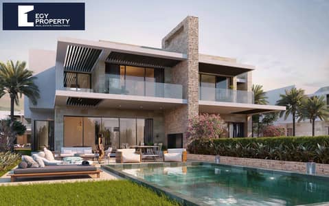 4 Bedroom Villa for Sale in North Coast, Matruh - 4-Back-m1-s. jpg