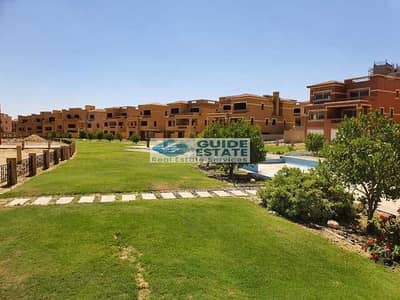 6 Bedroom Townhouse for Sale in New Cairo, Cairo - On the landscape and Fountain Townhouse Corner 560m Finishing with Pool & AC'S For Sale In Katameya Gardens Near AUC Mivida Emaar Mountain View Dunes