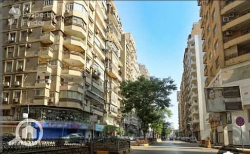 أرض سكنية  للبيع في الدقى، الجيزة - عمارة للبيع بمنطقة نادي الصيد