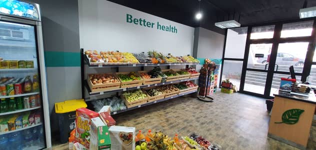 Retail for Rent in Haram, Giza - محل للايجار علي شارع الهرم - بجوار صيدلية العزبى