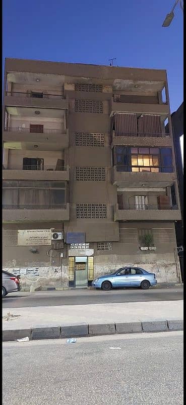 أرض سكنية  للبيع في الدقى، الجيزة - عمارة للبيع في شارع السودان