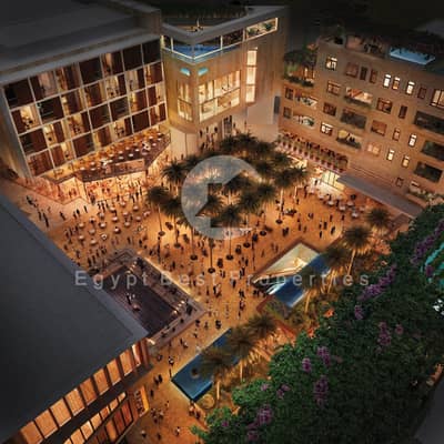 شقة فندقية 3 غرف نوم للبيع في الشيخ زايد، الجيزة - gECqtJYa8T6R6OS3Go1mdUphIhSwSn40W17_Bird_seyeviewoftheplaza-Night_200911063. jpg