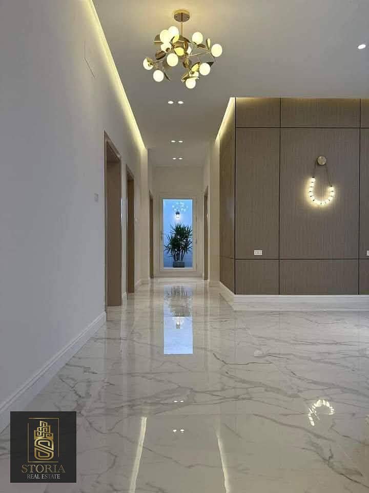 2 White marmor floor with warm lighting. jpg
