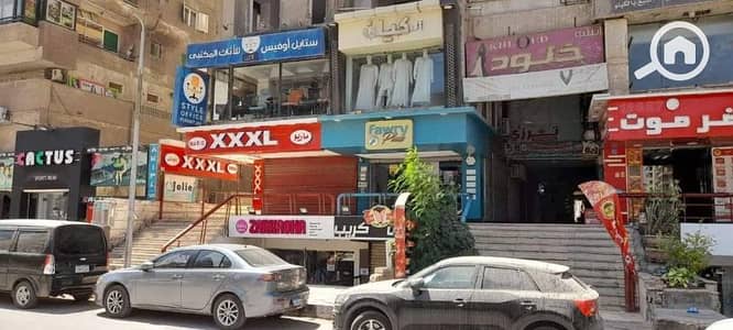 محلات تجارية  للبيع في فيصل، الجيزة - محل للبيع في فيصل الرئيسي 60م مؤجر لي براند يوجد مساحات واسعار
