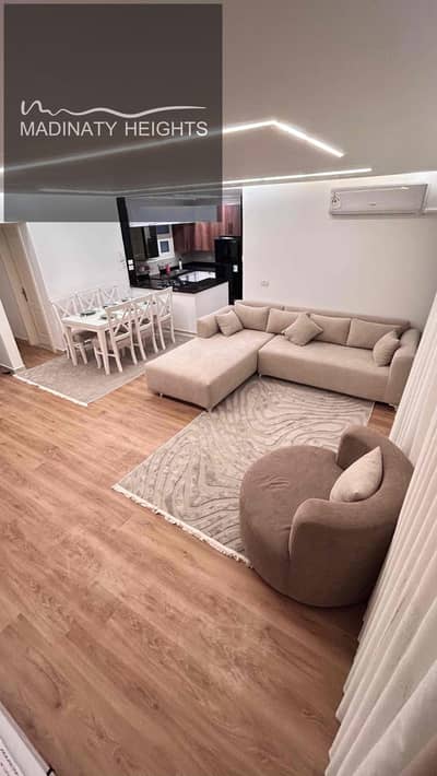 شقة فندقية 3 غرف نوم للايجار في مدينتي، القاهرة - 1d0155de-b3de-4ee8-8fbb-1352589a5a30. jpg