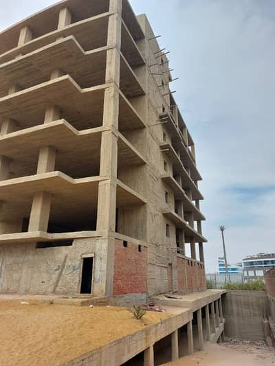 Commercial Land for Sale in New Cairo, Cairo - 7-story administrative building in the Fifth Settlement