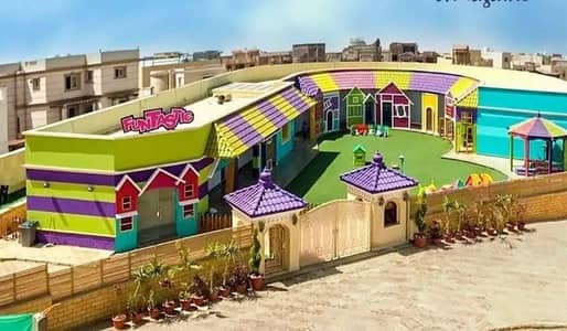أرض تجارية  للبيع في 6 أكتوبر، الجيزة - للبيع ارض حضانة في ٦ اكتوبر الحي الاول موقع حيوي
