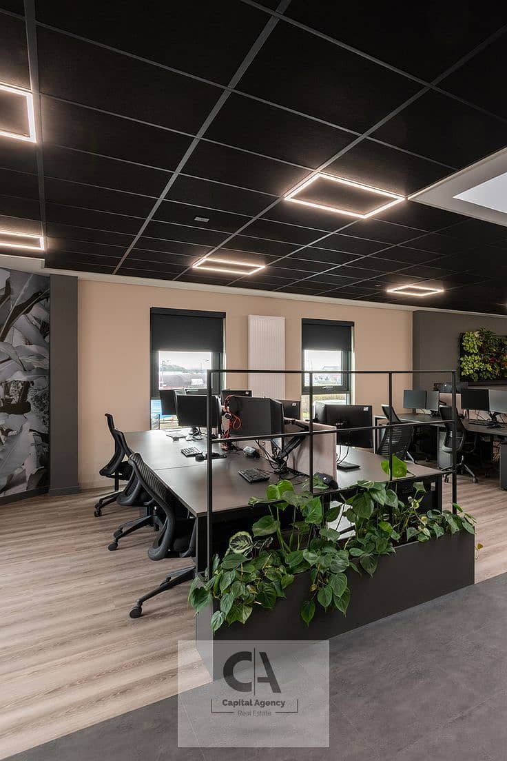 4 Repeat shape accents play their part in this recent office space in Derby_. jpeg